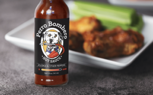 dog on perro bombero hot sauce bottle